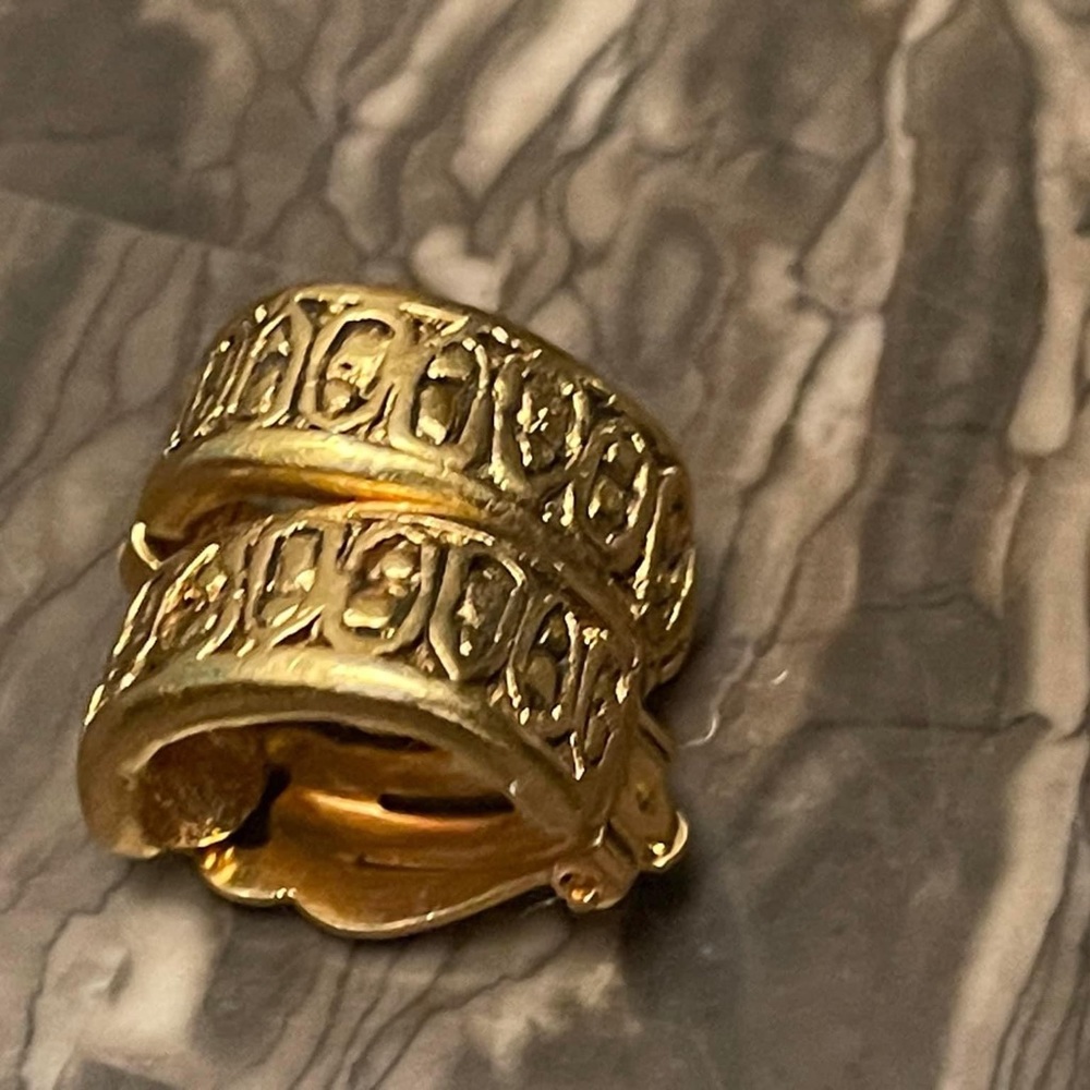 Chanel gold tone heavy earrings.